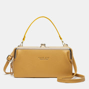 Spacious and Versatile Kiss-lock Crossbody Phone Bag